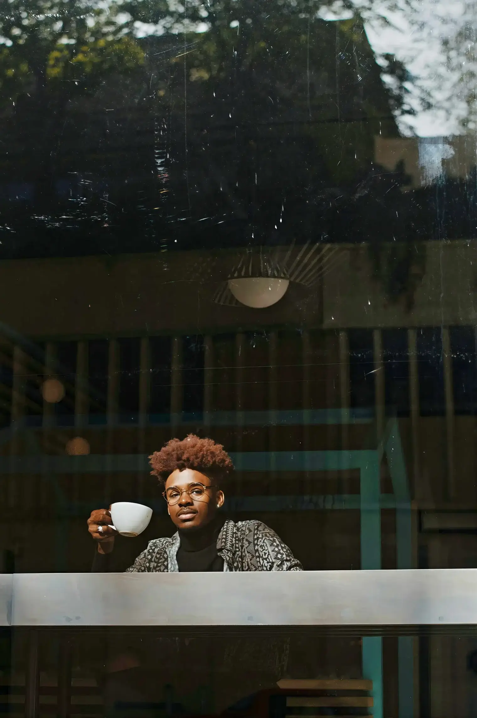 the marlow man at window cafe